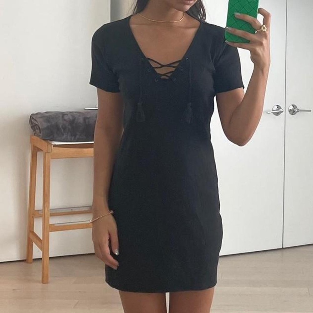 Hollister short-sleeve black dress with tie v-neck design in size medium